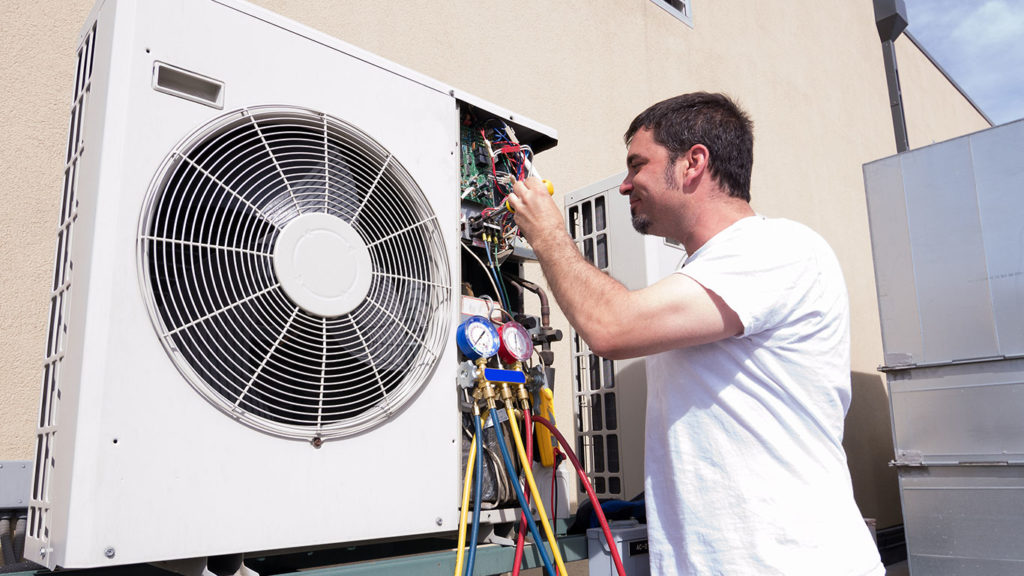 Air Specialties professional with a mini split air conditioner in New Haven County, CT