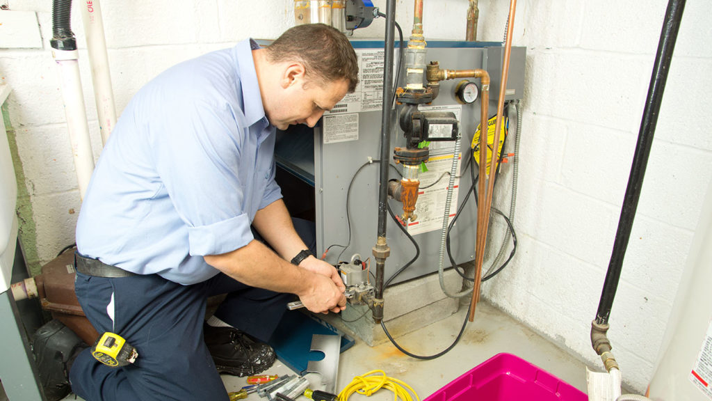 Air Specialties professional providing furnace maintenance in New Haven County, CT
